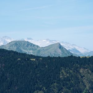 Preview wallpaper mountain range, mountains, trees, distance