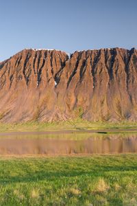 Preview wallpaper mountain, relief, peak, river, valley, grass, landscape