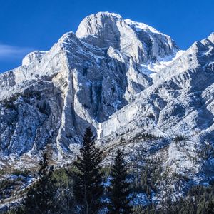 Preview wallpaper mountain, relief, snow, trees, landscape