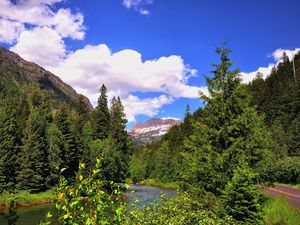 Preview wallpaper mountain, river, grass, trees