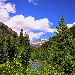 Preview wallpaper mountain, river, grass, trees