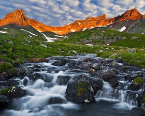 Preview wallpaper mountain river, stones, cascades, morning, sky, shadow, moss, landscape