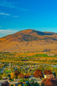 Preview wallpaper mountain, river, valley, buildings, village