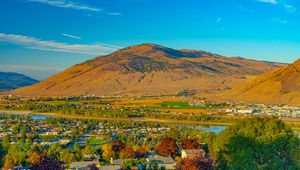 Preview wallpaper mountain, river, valley, buildings, village