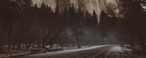 Preview wallpaper mountain, road, fog, trees, turn