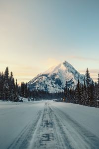 Preview wallpaper mountain, road, snow, winter, trees, landscape