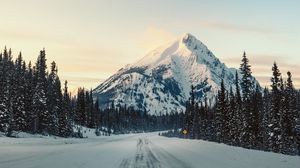 Preview wallpaper mountain, road, snow, winter, trees, landscape