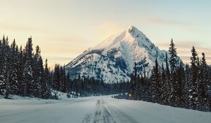 Preview wallpaper mountain, road, snow, winter, trees, landscape