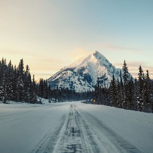 Preview wallpaper mountain, road, snow, winter, trees, landscape