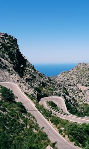 Preview wallpaper mountain, road, winding, grass, beautiful landscape