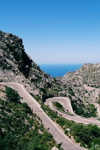 Preview wallpaper mountain, road, winding, grass, beautiful landscape