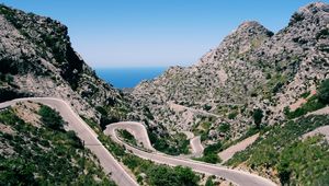 Preview wallpaper mountain, road, winding, grass, beautiful landscape