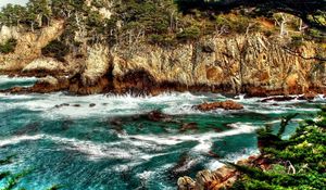 Preview wallpaper mountain, rock, bottom, sea, water, wave, greens, vegetation