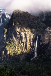 Preview wallpaper mountain, rock, cliff, waterfall, trees, landscape