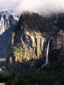 Preview wallpaper mountain, rock, cliff, waterfall, trees, landscape