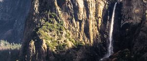 Preview wallpaper mountain, rock, cliff, waterfall, trees, landscape