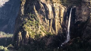 Preview wallpaper mountain, rock, cliff, waterfall, trees, landscape