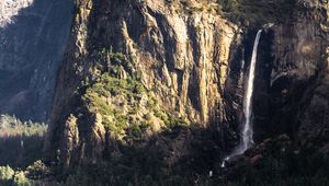 Preview wallpaper mountain, rock, cliff, waterfall, trees, landscape