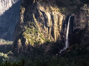 Preview wallpaper mountain, rock, cliff, waterfall, trees, landscape