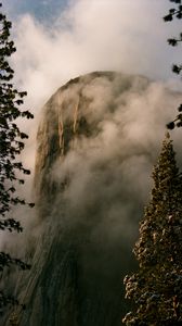 Preview wallpaper mountain, rock, clouds, trees, nature, landscape