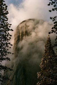 Preview wallpaper mountain, rock, clouds, trees, nature, landscape