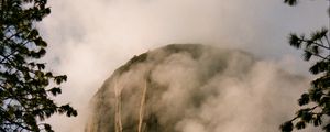 Preview wallpaper mountain, rock, clouds, trees, nature, landscape