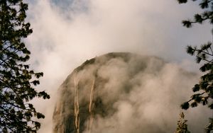 Preview wallpaper mountain, rock, clouds, trees, nature, landscape