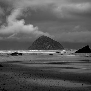 Preview wallpaper mountain, rock, coast, sea, black and white