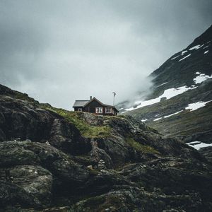 Preview wallpaper mountain, rock, house, nature, solitude, comfort