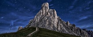 Preview wallpaper mountain, rock, path, night, starry sky