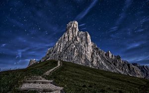 Preview wallpaper mountain, rock, path, night, starry sky