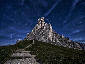 Preview wallpaper mountain, rock, path, night, starry sky