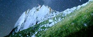 Preview wallpaper mountain, rock, slope, milky way, grass