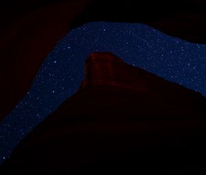 Preview wallpaper mountain, rock, starry sky, night, dark, darkness