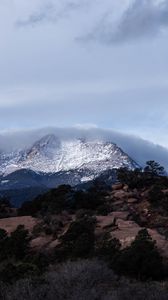 Preview wallpaper mountain, rock, stones, trees, clouds, nature