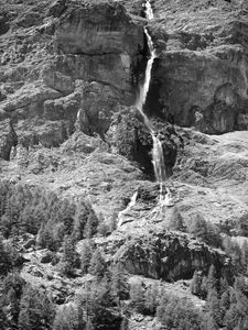 Preview wallpaper mountain, rock, waterfall, bw, landscape