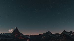 Preview wallpaper mountain, rocks, peak, starry sky, stars