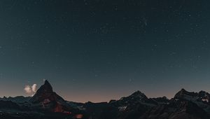 Preview wallpaper mountain, rocks, peak, starry sky, stars