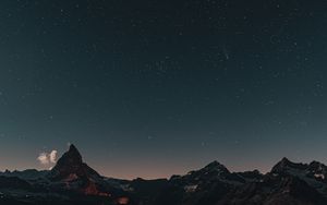 Preview wallpaper mountain, rocks, peak, starry sky, stars