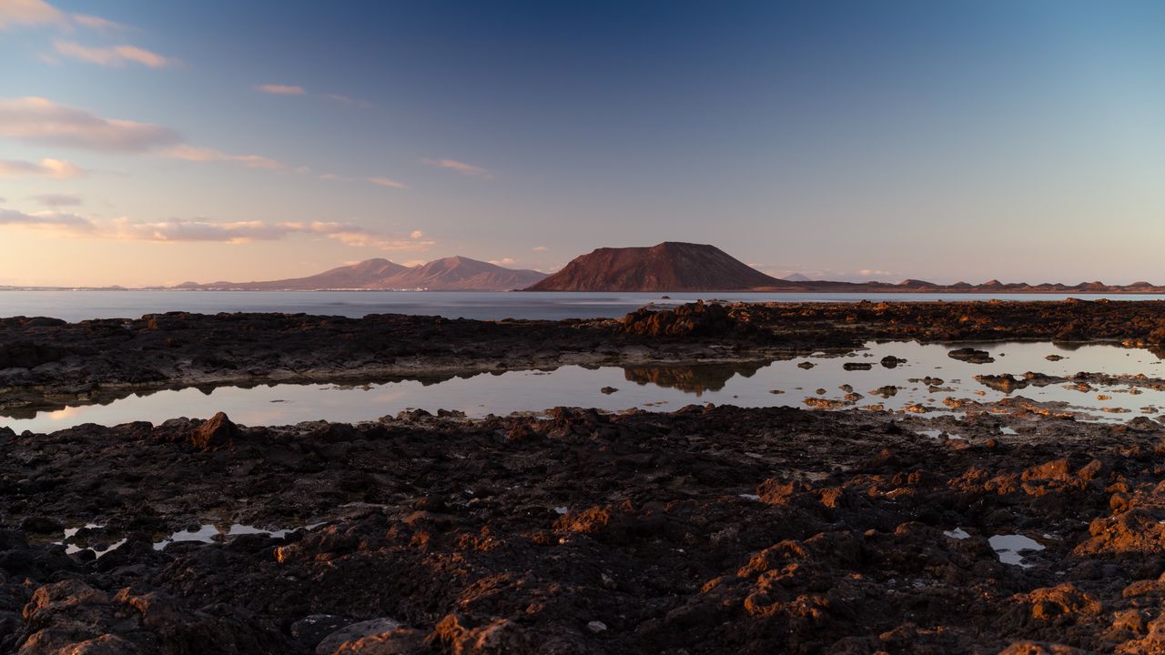 Wallpaper mountain, rocks, stones, water, sky