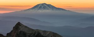 Preview wallpaper mountain, rocks, sunrise, fog