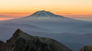 Preview wallpaper mountain, rocks, sunrise, fog