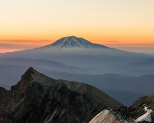 Preview wallpaper mountain, rocks, sunrise, fog