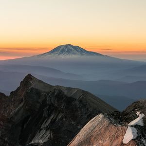 Preview wallpaper mountain, rocks, sunrise, fog