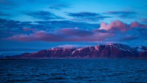 Preview wallpaper mountain, sea, clouds, purple, iceland