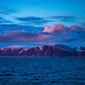 Preview wallpaper mountain, sea, clouds, purple, iceland