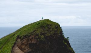 Preview wallpaper mountain, sea, silhouette, hill, landscape