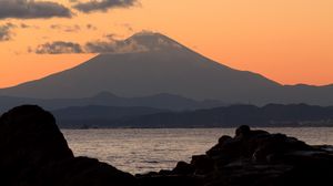Preview wallpaper mountain, sea, stones, twilight, nature