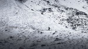 Preview wallpaper mountain, silhouette, alone, snow, slope