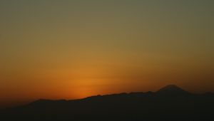 Preview wallpaper mountain, silhouette, outline, sunset, dusk